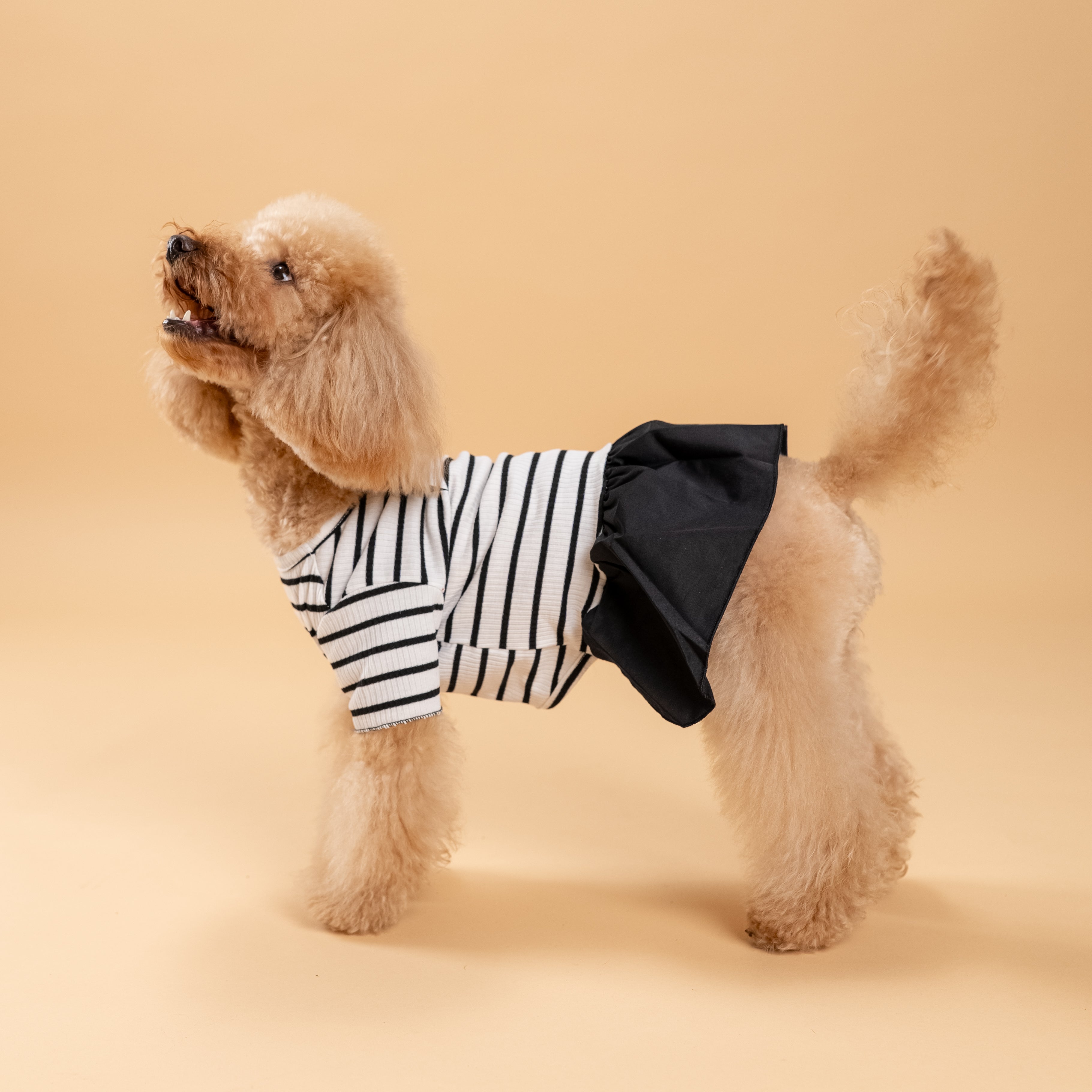 Vestitino a righe con fiocchetti