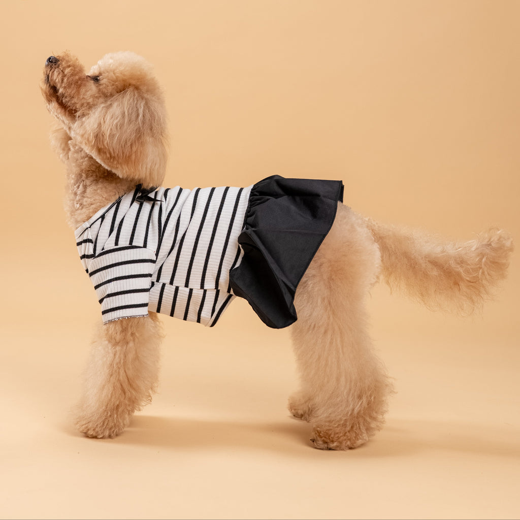 Vestitino a righe con fiocchetti