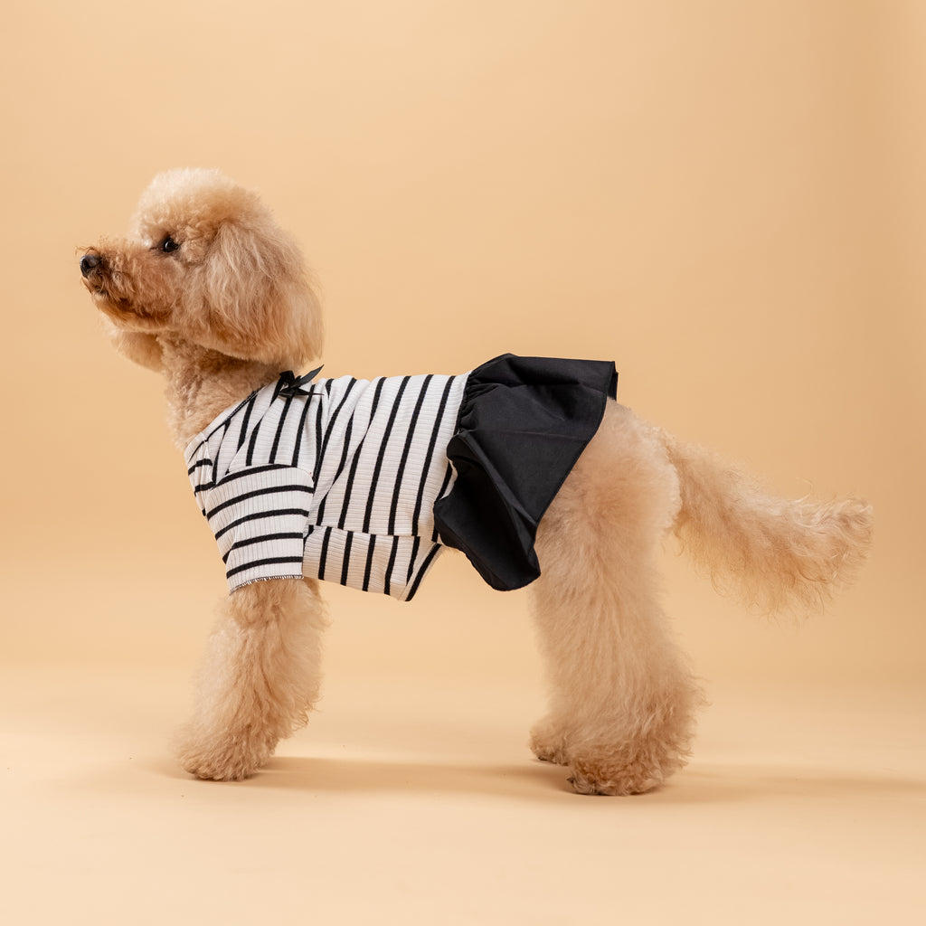 Vestitino a righe con fiocchetti